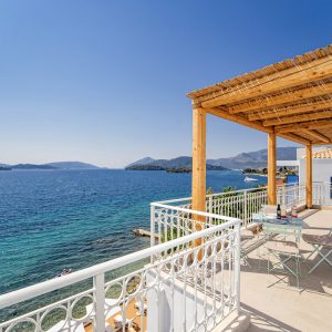 blue-lefkada-luxury-apartments-terrace-seating-wine copy