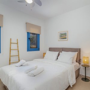 lefkada-blue-luxury-apartments-bed-ladder-fan copy