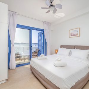 lefkada-blue-luxury-apartments-bed-lamps-fan copy