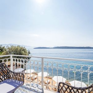 lefkada-blue-luxury-apartments-chairs-sea-white-railing copy